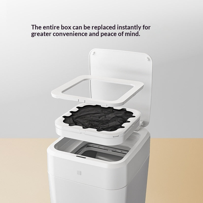 White trash bin with open lid showing black trash bag, on a light gray background.