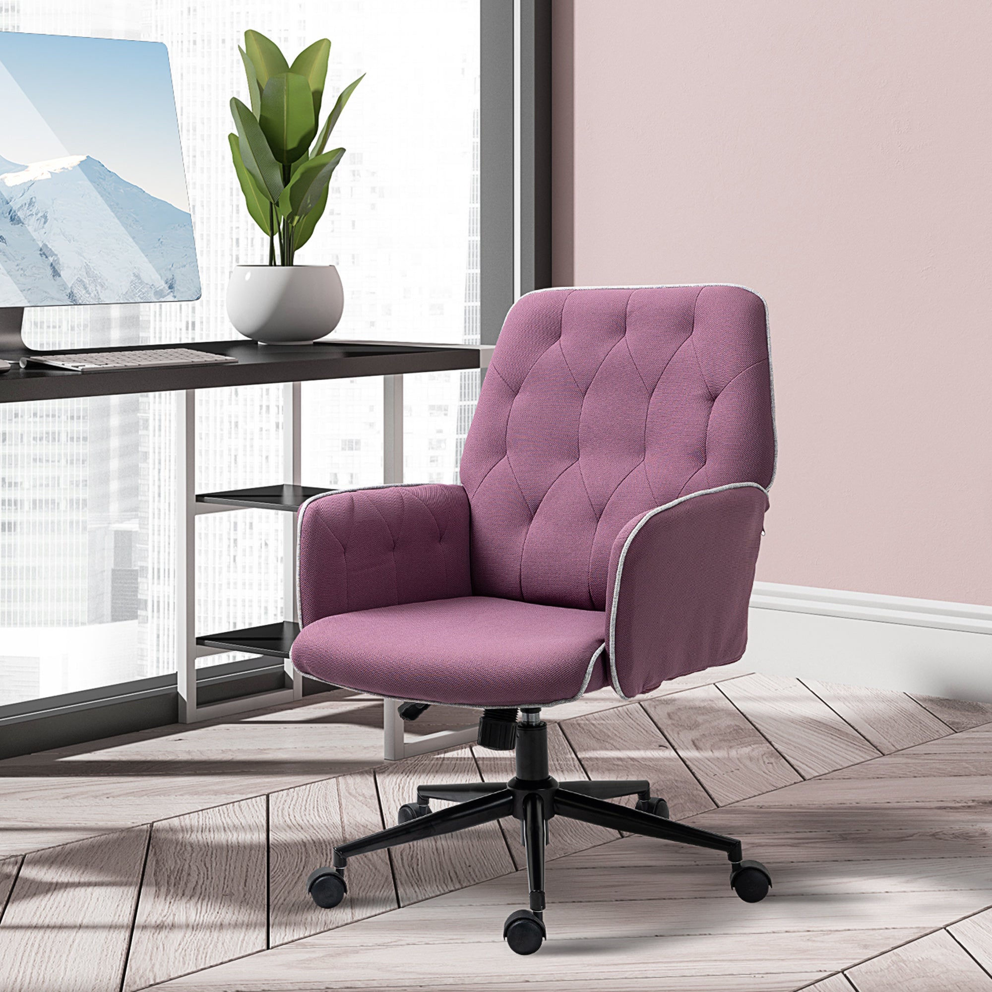 Purple office chair in a modern office setting with a desk and computer monitor.