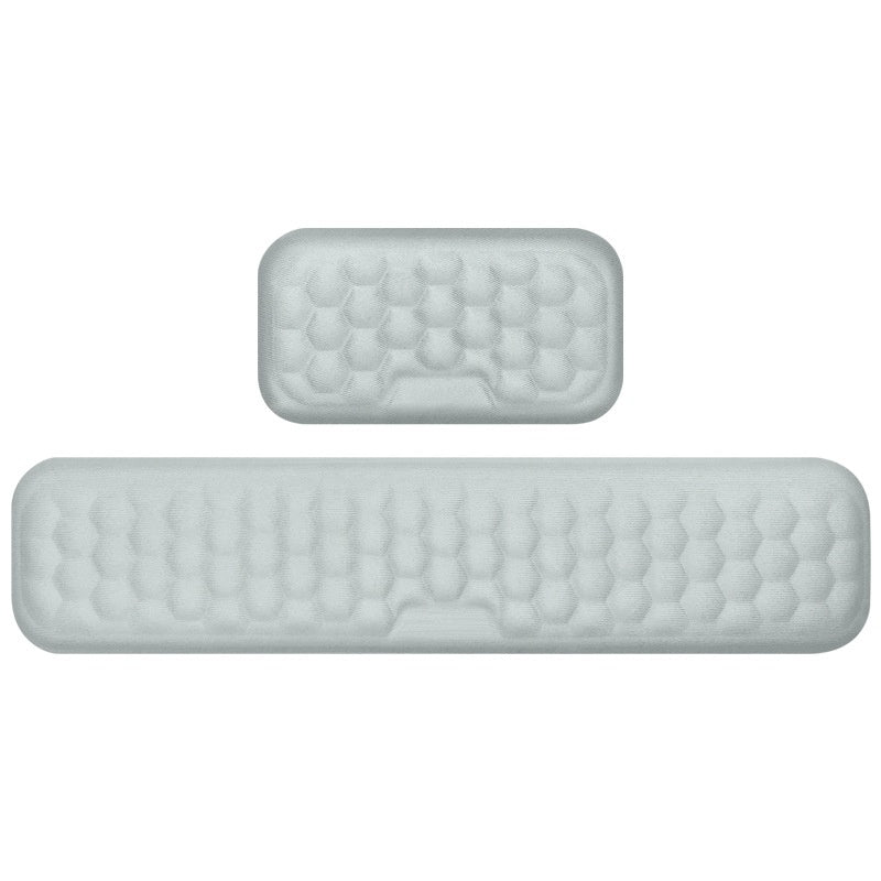 Two light gray textured door mats on a white background