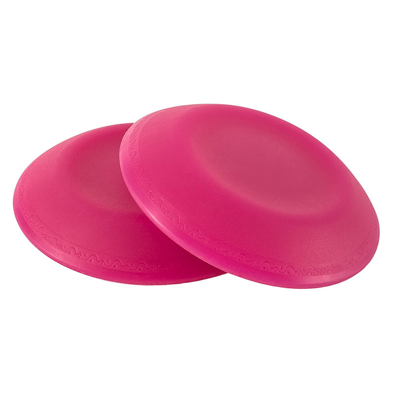 Two pink frisbees on a white background