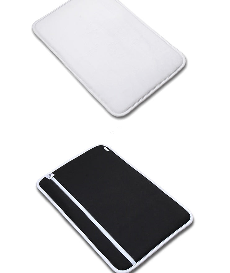 Two tablet cases, one white and one black with a zipper, on a white background.