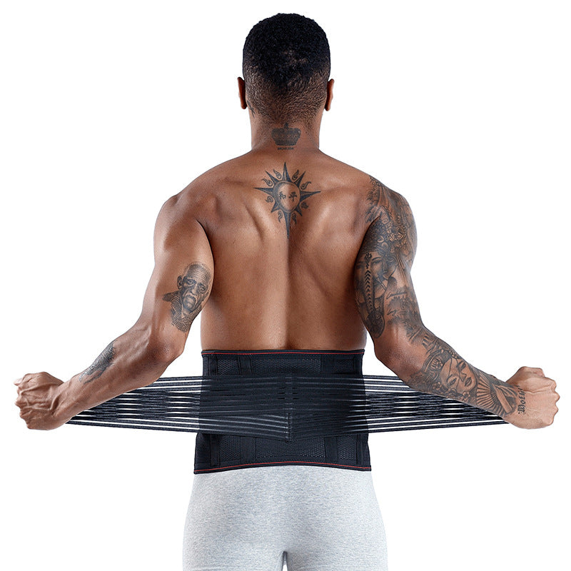 Man wearing a black waist trainer with tattoos on his back