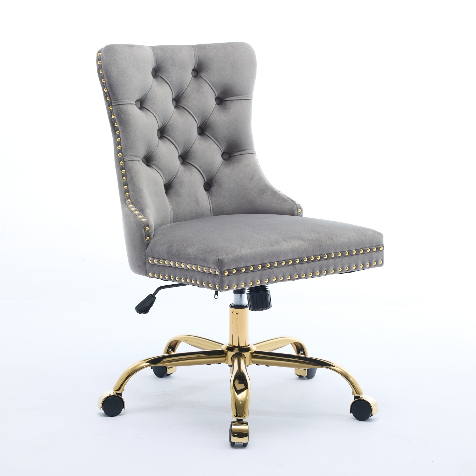 Gray tufted office chair with gold accents on a white background