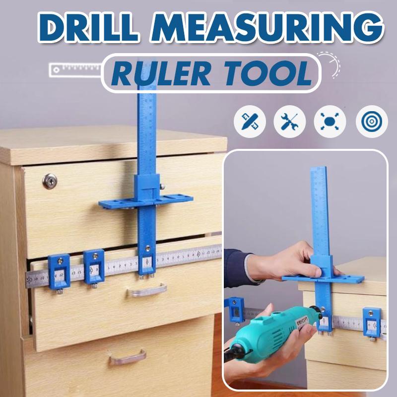 Drill measuring ruler tool with a drill on a wooden surface