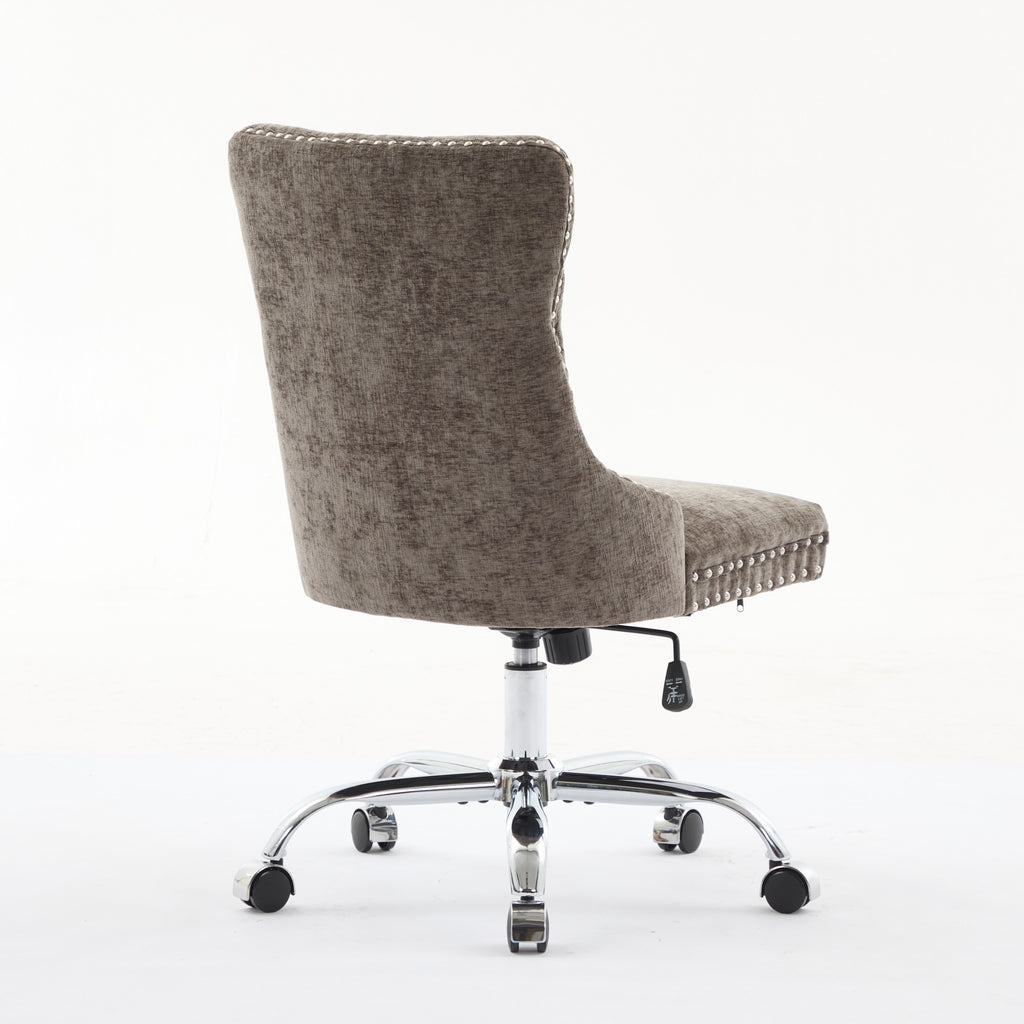 Brown office chair with chrome base on a white background