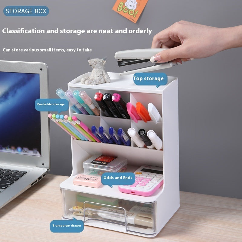 White desk organizer with stationery items on a wooden desk next to a laptop.