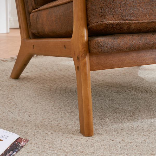 Brown leather chair with wooden legs on a carpeted floor