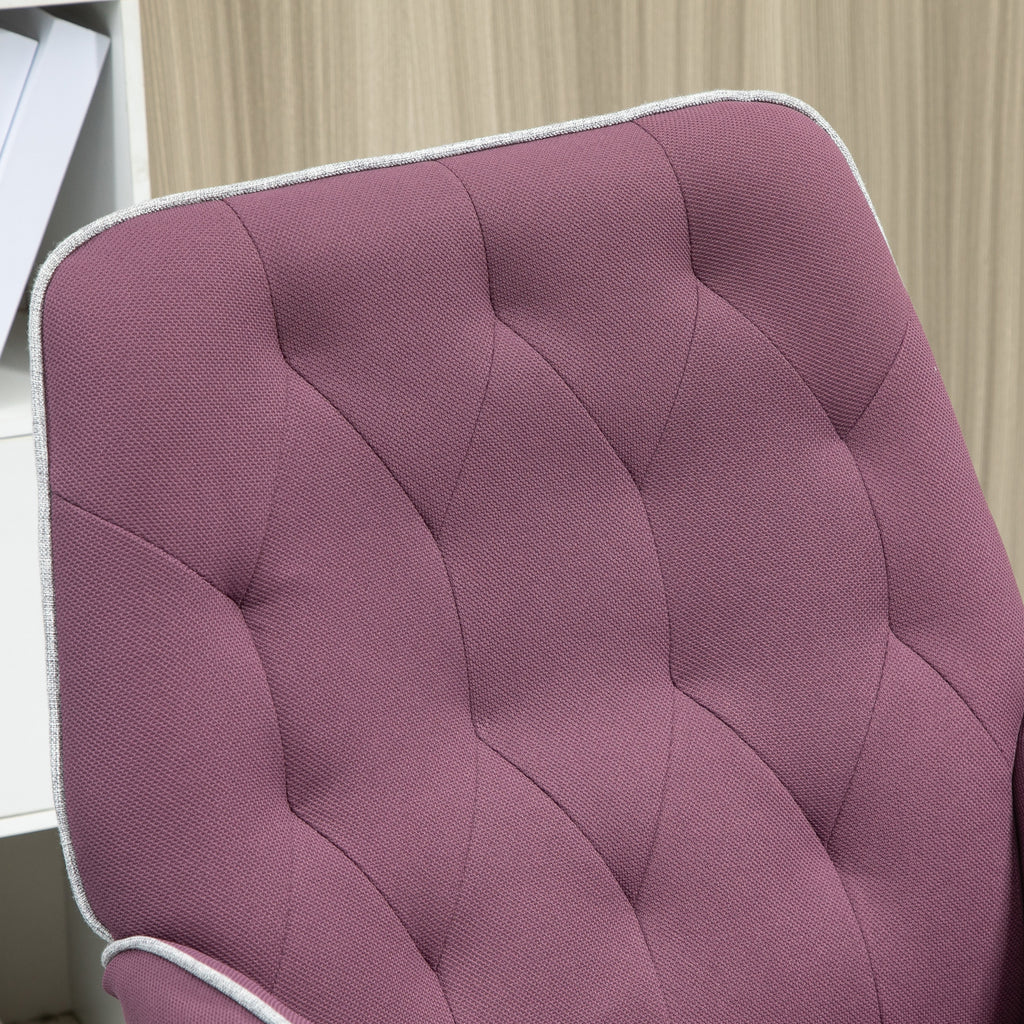 Close-up of a pink office chair cushion with a textured pattern.