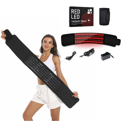Woman holding a red LED therapy wrap with additional components on a white background