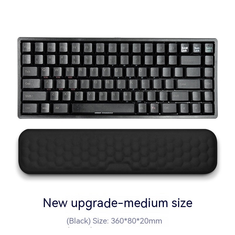 Mechanical keyboard with wrist rest on a white background