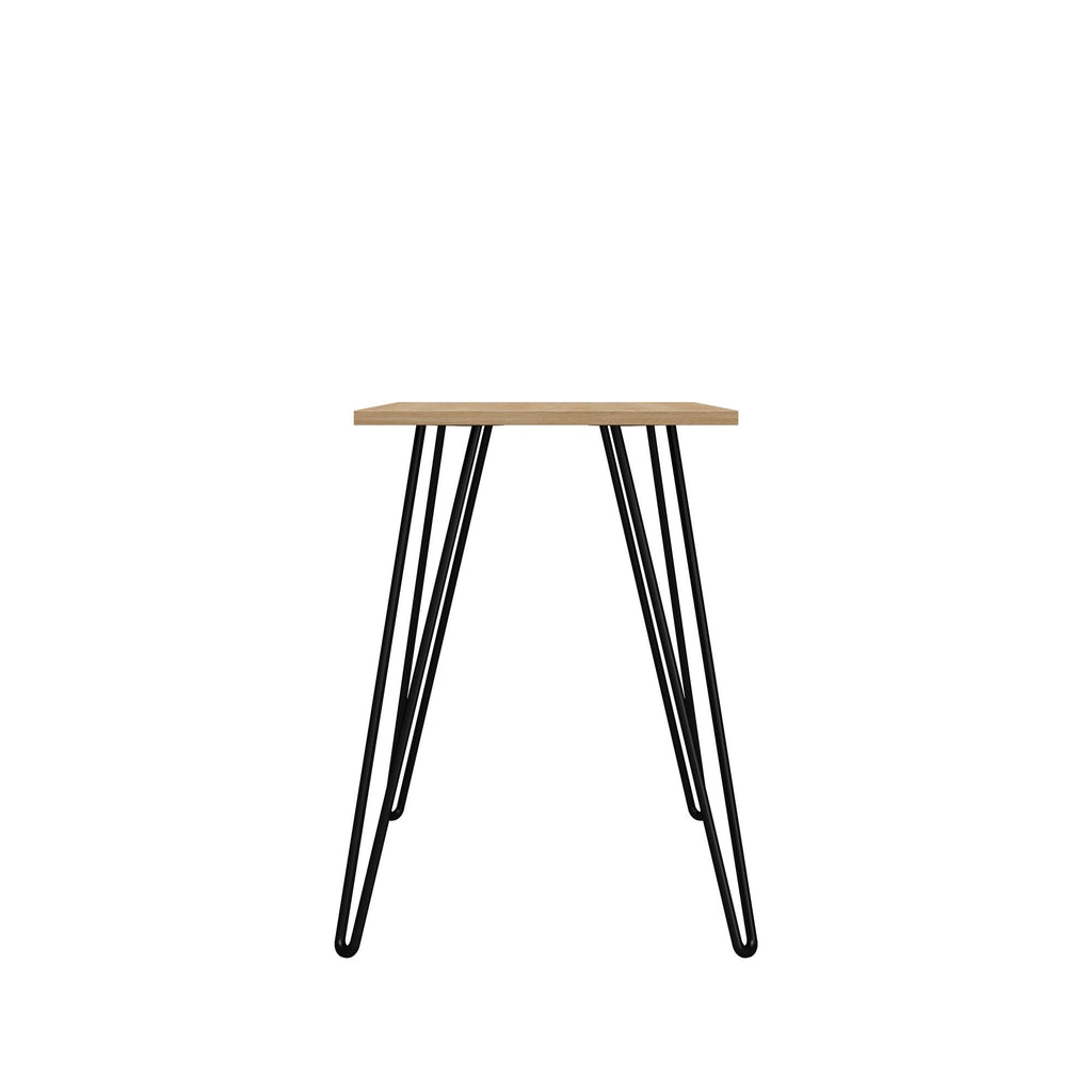 Small round table with a wooden top and black metal legs on a white background