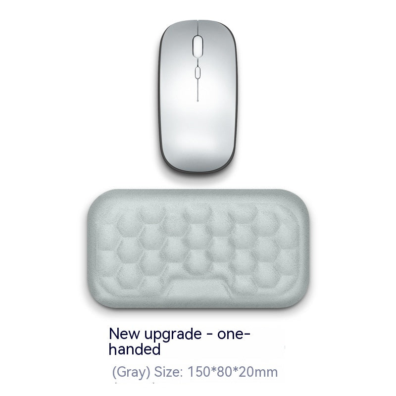 Gray computer mouse and mouse pad on a white background