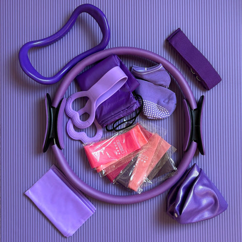 Purple resistance band set on a purple mat