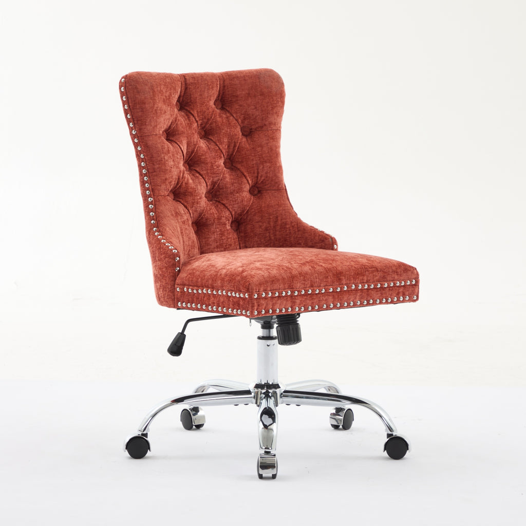 Orange office chair with tufted backrest in a home office setting