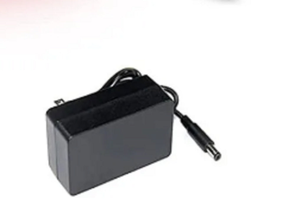 Black power adapter with a cable on a white background