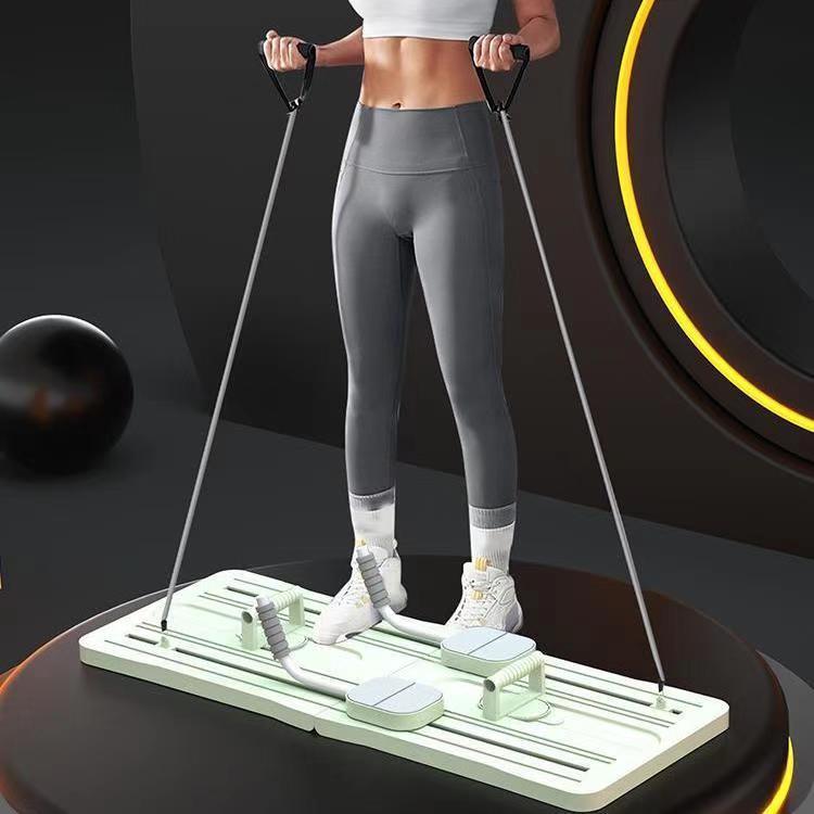 Person using a step machine on a dark background