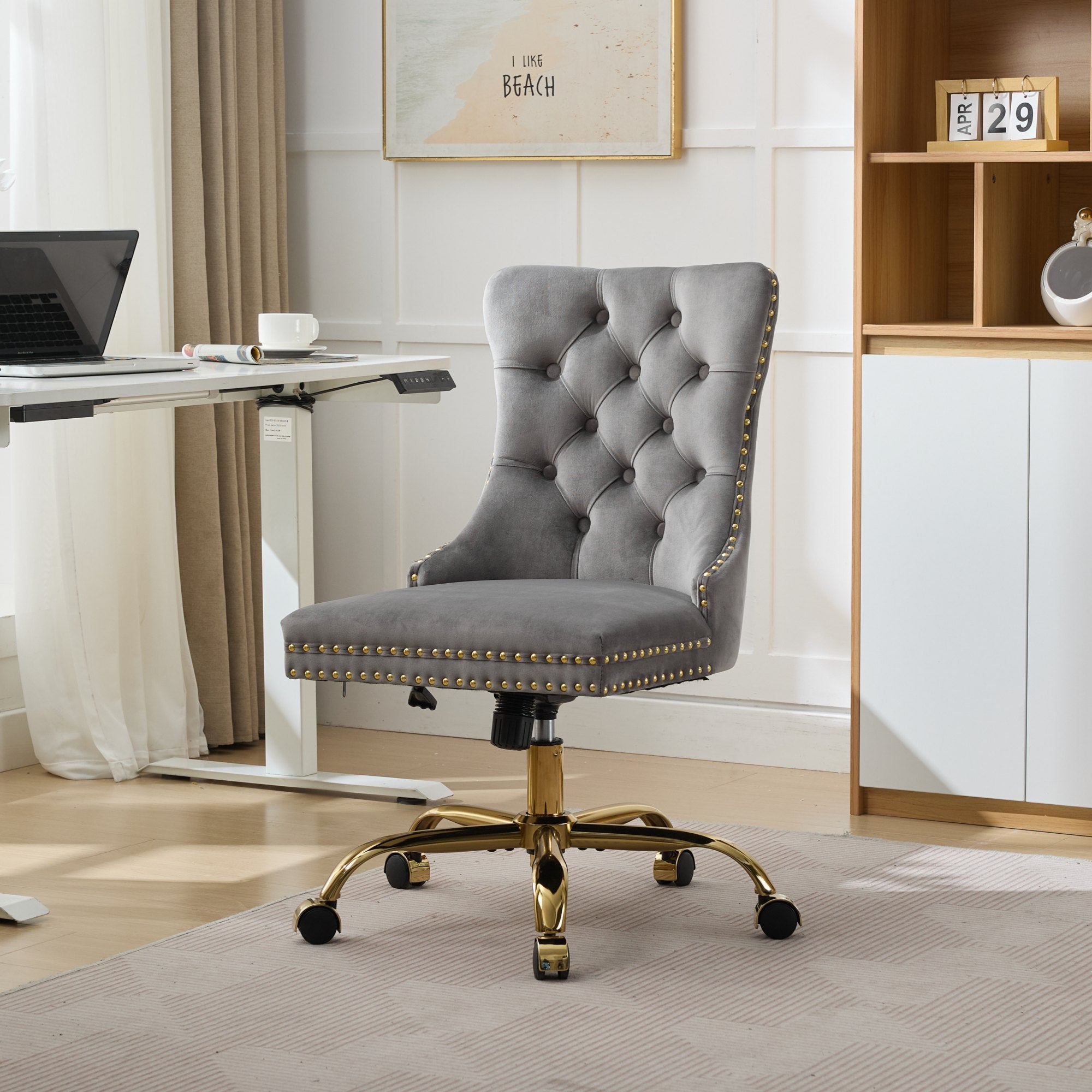 Gray office chair with gold accents in a home office setting