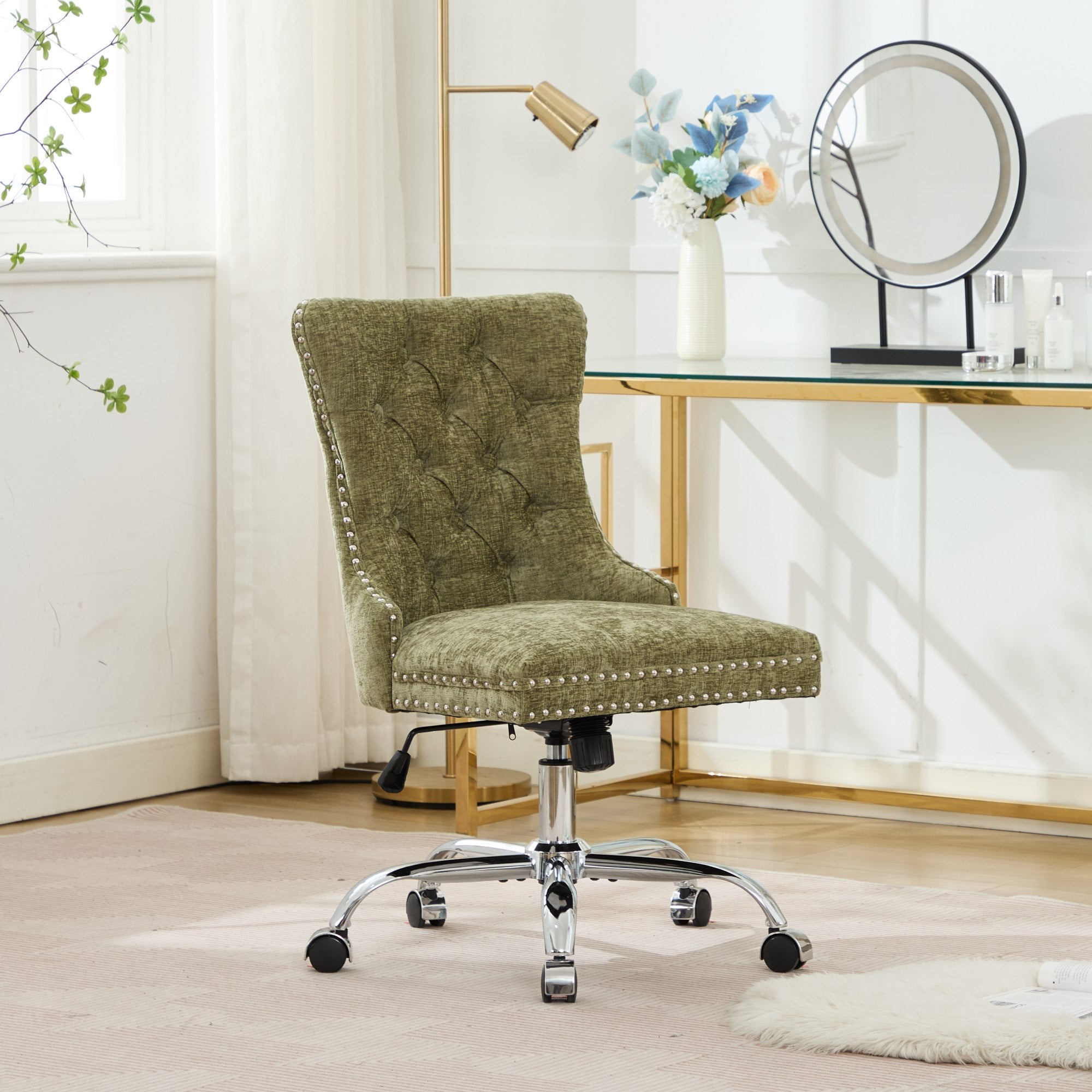 Green office chair with chrome base in a room with a desk and decor.