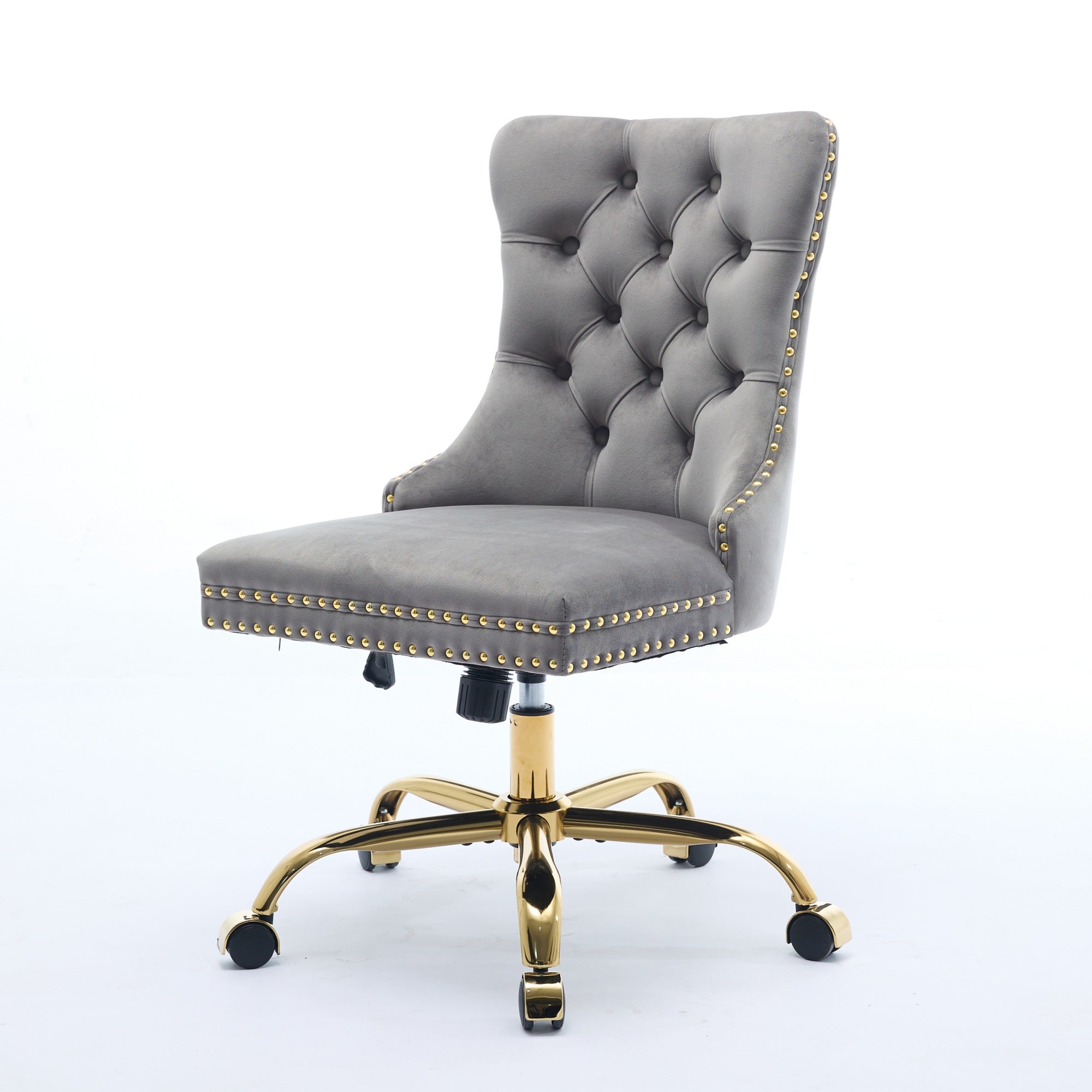Gray tufted office chair with gold accents on a white background
