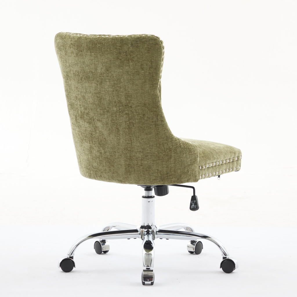Green office chair with studded details on a white background