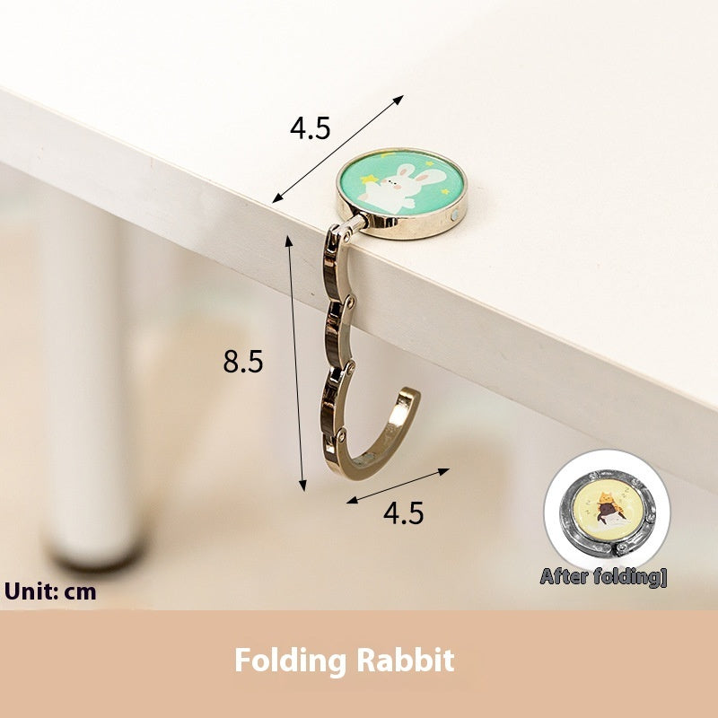 Folding rabbit hook with measurements on a white background