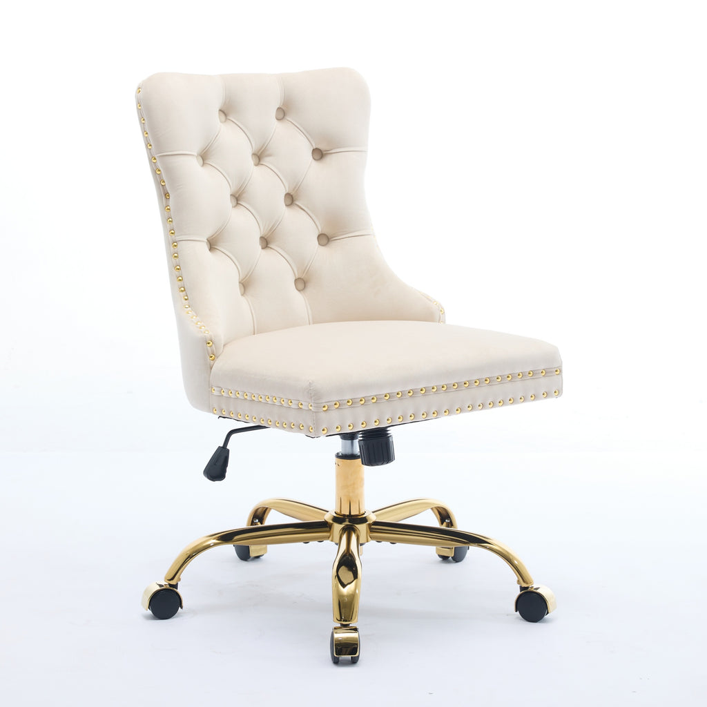Beige office chair with chrome base in a room with a desk and decor.