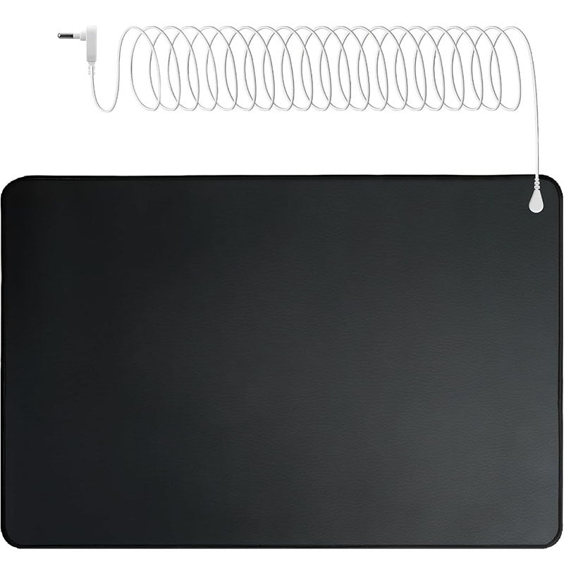 Black heating pad with coiled white cable on a white background