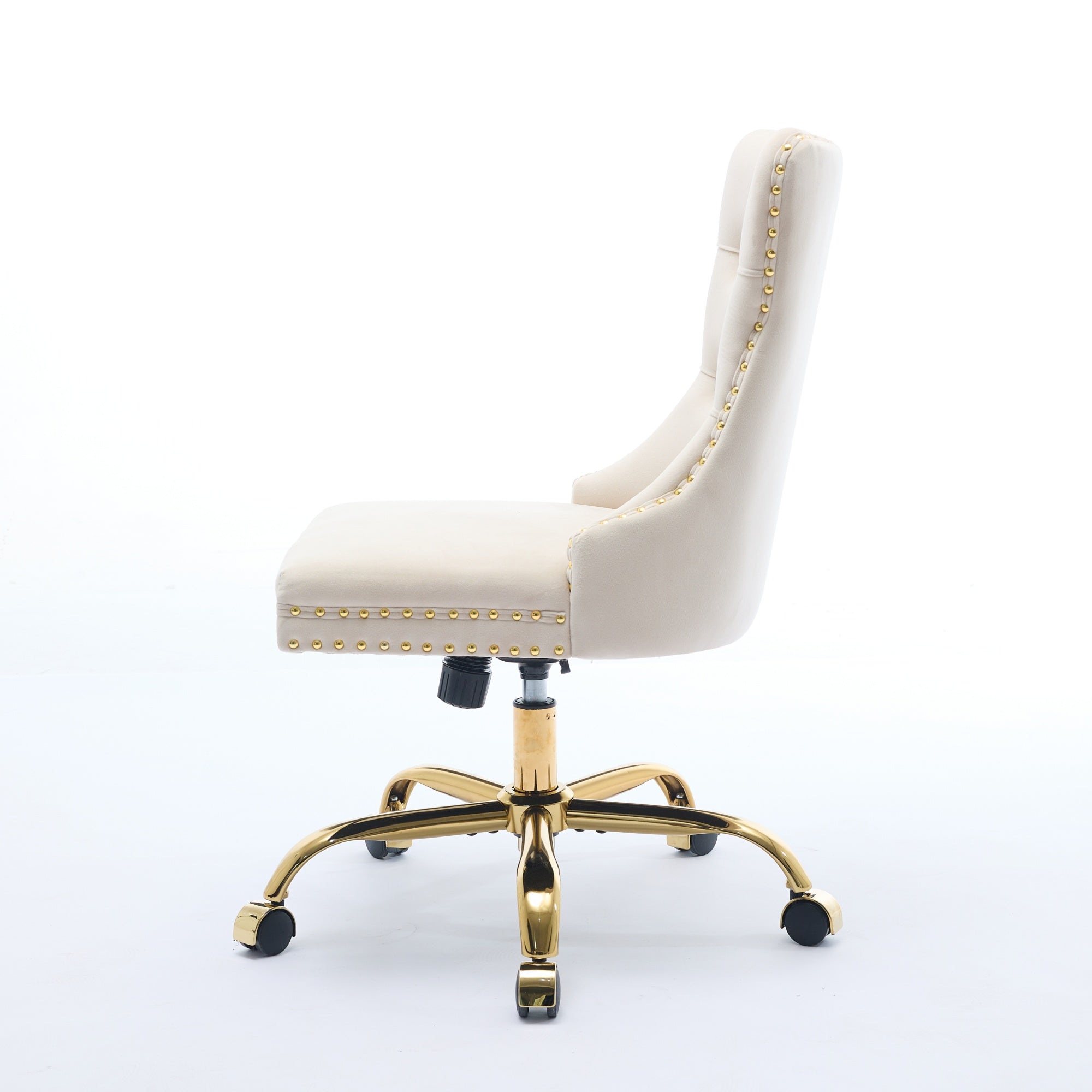 Beige office chair with chrome base in a room with a desk and decor.