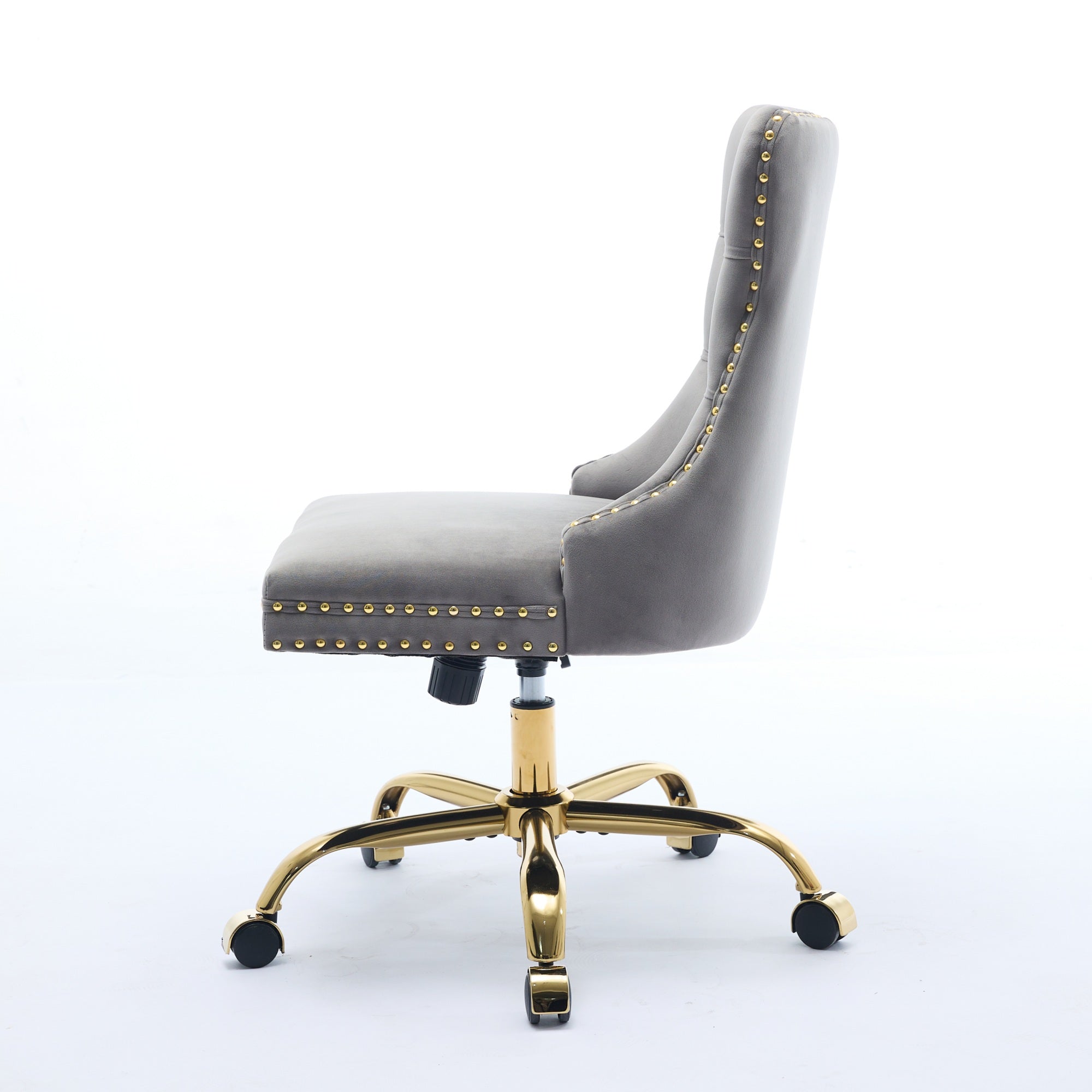 Gray office chair with tufted backrest and gold accents on a white background